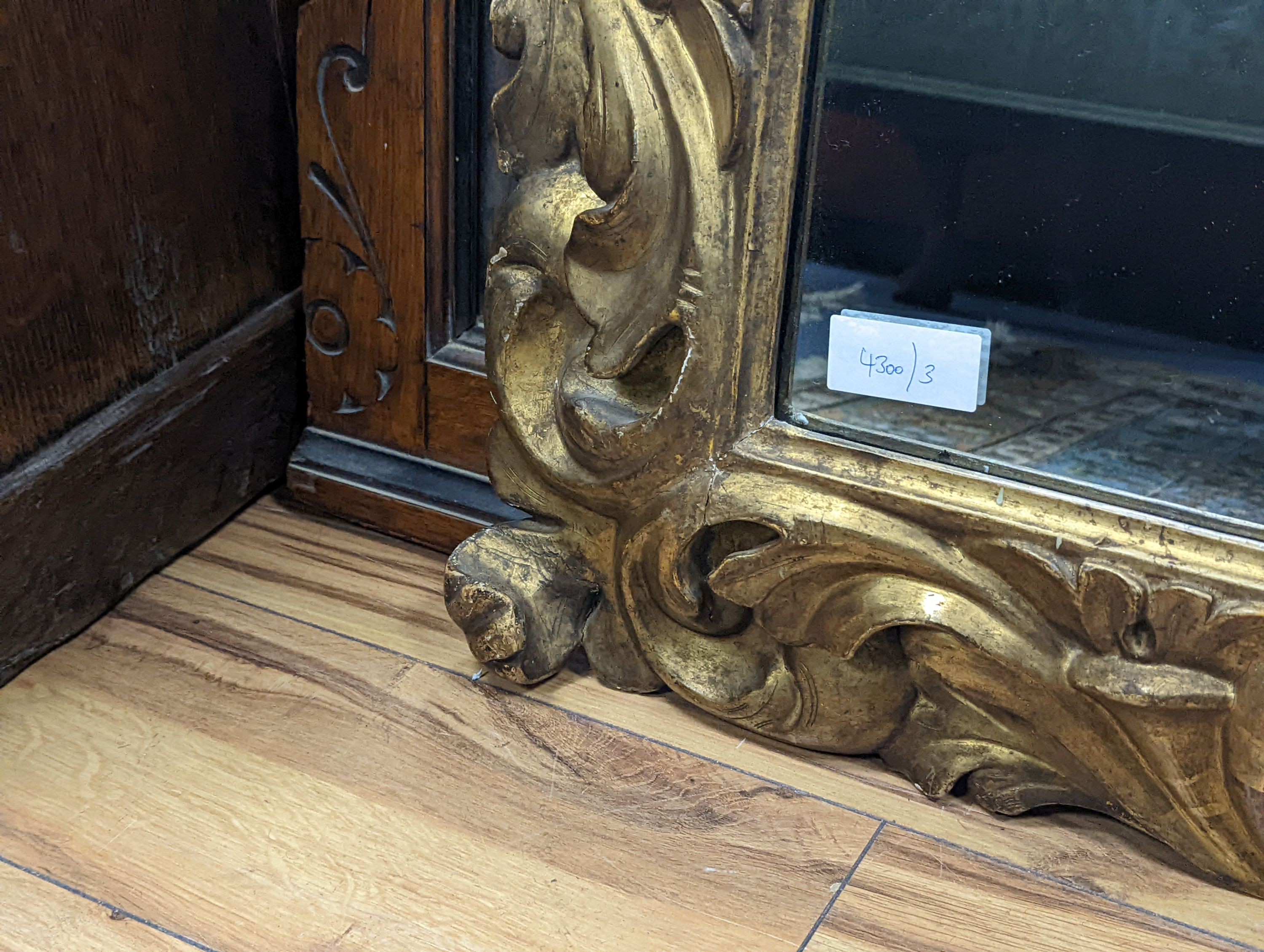A 19th century French carved giltwood wall mirror with acanthus scroll frame, width 91cm, height 108cm